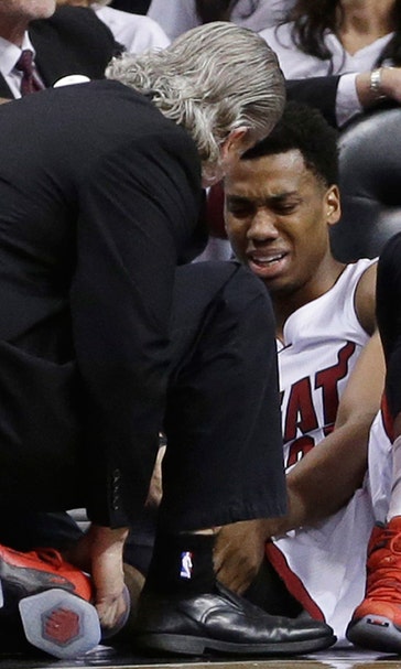 Heat center Hassan Whiteside leaves Game 3 with knee injury